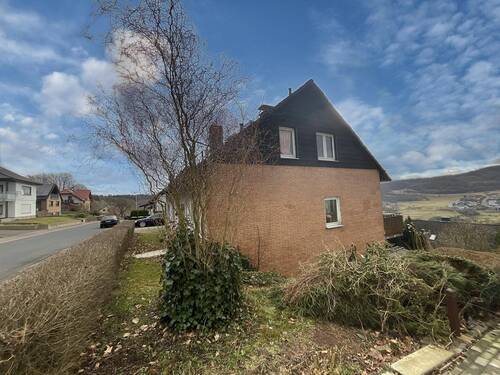 Seitenansicht - Einfamilienhaus mit 185,00 m&sup2; in Großalmerode zum Kaufen