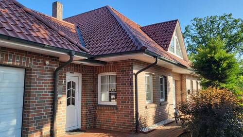 Seiteneingang - 7 Zimmer Einfamilienhaus zum Kaufen in Saterland