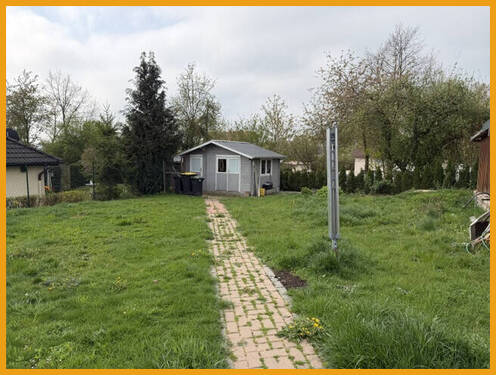 Gartenansicht mit Gartenhaus - 2 Zimmer Mehrfamilienhaus, Wohnhaus in Willingshausen / Loshausen