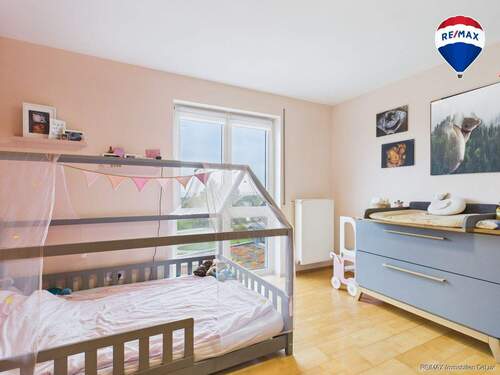 RE/MAX Immobilien DeLux Einfamilienhaus Mettlach-Weiten Schlafzimmer - 