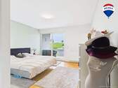 RE/MAX Immobilien DeLux Einfamilienhaus Mettlach-Weiten Schlafzimmer - 