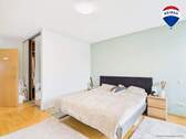 RE/MAX Immobilien DeLux Einfamilienhaus Mettlach-Weiten Schlafzimmer - 