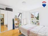 RE/MAX Immobilien DeLux Einfamilienhaus Mettlach-Weiten Schlafzimmer - 
