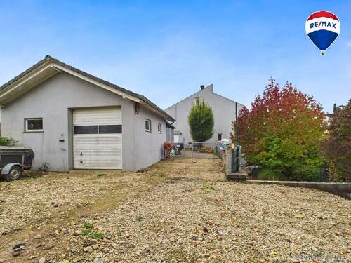 RE/MAX Immobilien DeLux Einfamilienhaus Mettlach-Weiten Garage - 