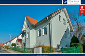 Titelbild - Traumhaftes Architekten-Zweifamilienhaus: Flexibles Wohnen in idyllischer Ruhe