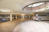 Zur Wohnung zugehörige Tiefgaragenplatz - 