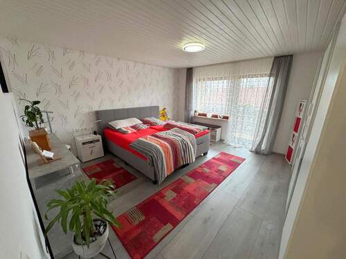 Schlafzimmer - Mehrfamilienhaus, Wohnhaus mit 113,00 m&sup2; in Steinheim zum Kaufen