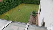 Blick-vom-Balkon-in-Garten - 