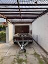 Carport vor der Garage - 