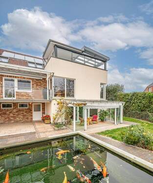 Ansicht - Zweifamilienhaus mit zwei Gewerbehallen