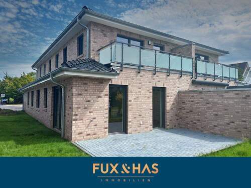 Bild 1 - Neuwertige Eigentumswohnung in Meppen - modern, energieeffizient mit Garten & Wärmepumpe!