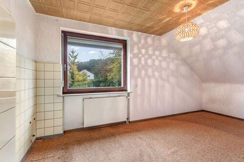 Schlafzimmer 5 oder Küche im Obergeschoss - 