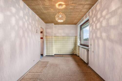 Schlafzimmer 5 oder Küche im Obergeschoss - 