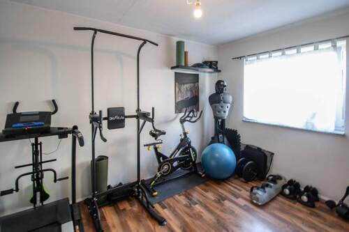07. Fitnessraum_ Schlafzimmer - 