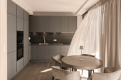 Warmes Licht, edle Materialien – Küche und Essbereich in perfektem Einklang - Designwohnung im Grand Tower mit Concierge und weitblick