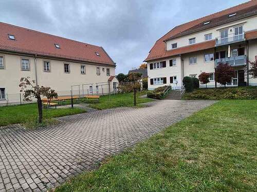 Teilansicht Innenhof - Etagenwohnung mit 84,50 m² in Bannewitz zum Kaufen