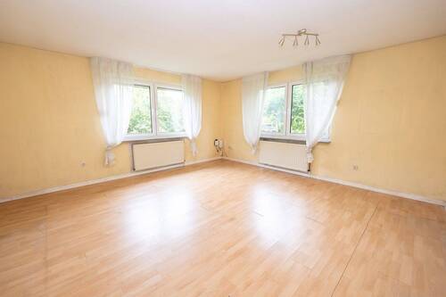 Wohnzimmer - Einfamilienhaus mit 91,20 m² in Drochtersen zum Kaufen