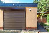 Massive Garage mit Rolltor - Einfamilienhaus mit 110,00 m&sup2; in Berlin zum Kaufen