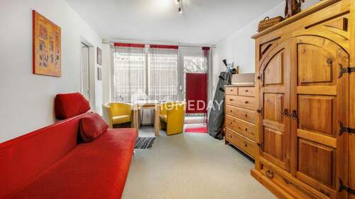 Wohnzimmer 1 - 2 Zimmer Etagenwohnung zum Kaufen in München