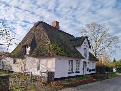 Ansicht Zufahrt mit Gartentor - Einfamilienhaus mit 80,00 m&sup2; in Mildstedt zum Kaufen