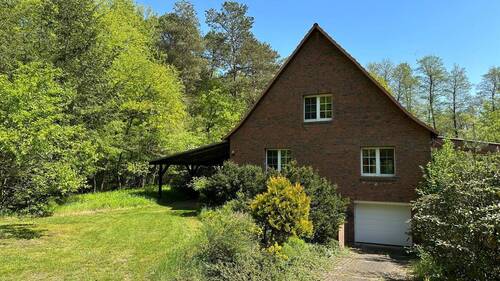  Rückansicht mit Tiefgarage - Einfamilienhaus mit 152,00 m&sup2; in Höfer zum Kaufen