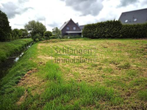 Seitenansicht b. Graben - Grundstück in Apen / Augustfehn
