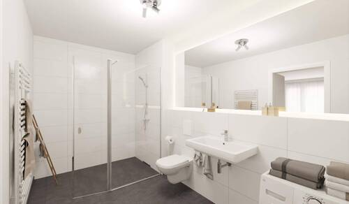 Eines der Badezimmer mit bodengleicher Dusche - 