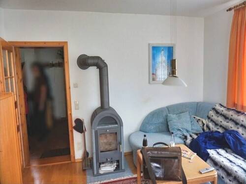 Wohnzimmer mit Kaminofen - 