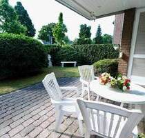 Traumhafte 122 m² Erdgeschosswohnung mit großzügigem Garten, Terrasse und TG Platz in Büderich - Meerbusch