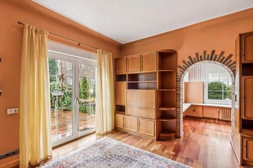 Terrassenzimmer im EG mit Blick in den Wintergarten - 