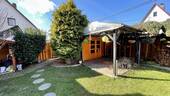 Garten mit Schuppen und zweiter überdachter Terrasse - 