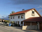 Haus von Straße aufwärts - 