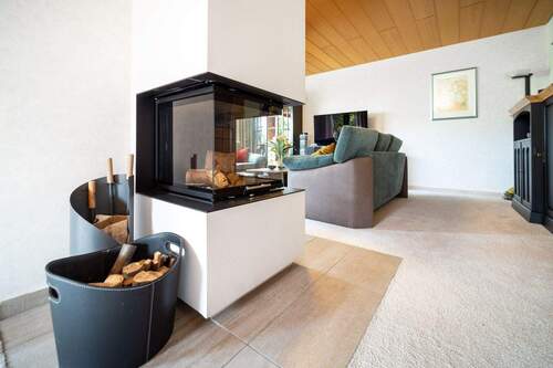 Innen EG Wohnzimmer Kamin - Einfamilienhaus mit 172,00 m&sup2; in Bielefeld zum Kaufen