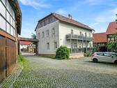 Außenansicht Haus 38 - Reiterhof mit Weide, Mehrfamilienhau und Garagen (A1615)