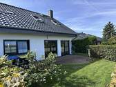 Terrasse Nord-Ost - Einfamilienhaus mit Einliegerwohnung und idyllischem Grundstück in ruhiger Ortsrandlage und Blick auf die umliegenden Felder bis hin zum Torgelower Se