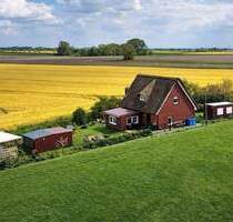 Ihr perfekter Rückzugsort mit Weitblick! Reetdachhaus vielseitig nutzbar in Groven!