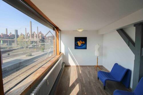 Lesezimmer Wohnung mit Blick auf das Weltkulturerbe Völklinger Hütte - 