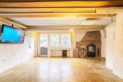 Wohnzimmer UG - leergeräumt - 3 Zimmer Einfamilienhaus in Wandlitz