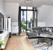 Im Herzen von Hilden: charmante DG-Wohnung, Aufzug, Balkon und TG-Platz