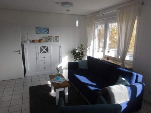 Wohnzimmer - Etagenwohnung mit 43,70 m&sup2; in Friedrichskoog zum Kaufen