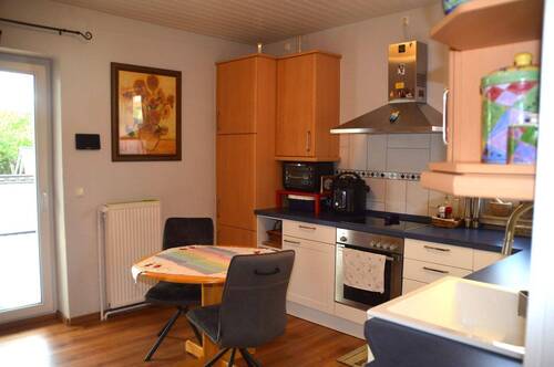 Großzügige Küche mit Terrassenzugang - 1 Zimmer Mehrfamilienhaus, Wohnhaus in Celle