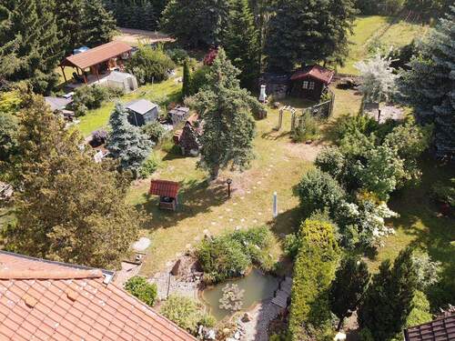 Blick in den Garten - Einfamilienhaus mit 110,00 m&sup2; in Weinböhla zum Kaufen