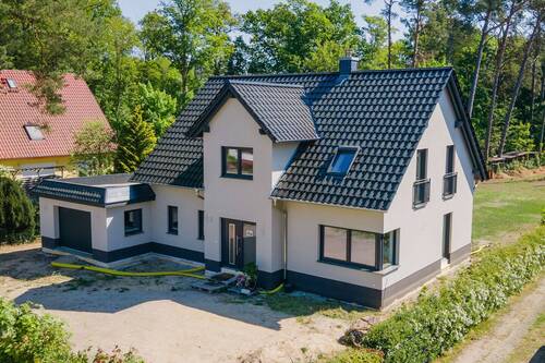 Einfamilienhaus in Bad Saarow - Neubau-Einfamilienhaus Bad Saarow - Mit Erdwärme, Fußbodenheizung, Einbauküche, Garage, Kamin u.v.m.