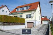 Titelbild - Gepflegtes Wohnhaus mit zwei Wohneinheiten, Nebengebäude und vielseitigen Nutzungsmöglichkeiten