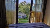 1. OG - Schlafzimmer mit Blick in den Garten - 