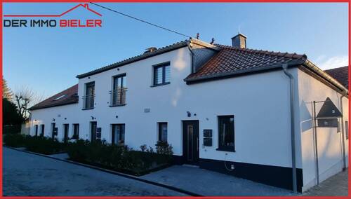 Hausansicht - Saniertes MFH mit 7 Wohneinheiten, 8 Kfz-Stellplätzen und 1 Garage in Ober-Olm zu verkaufen