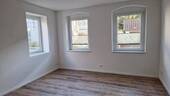 EG rechts Wohnzimmer m. FB-Heizung u. Kamin - 