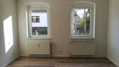 Wohnung Anbau EG Wohnzimmer m. Kamin - 