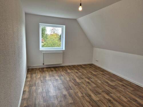 Wohnzimmer - 3 Zimmer Etagenwohnung in Barßel / OT Elisabethfehn