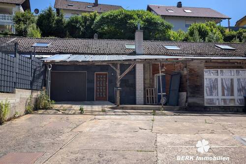 Außenaufnahme - BERK Immobilien - Wohnen mit Potenzial: Unkonventionelle Immobilie in Hausen